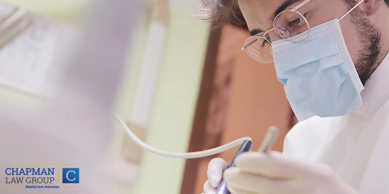 Doctor Working on Patient