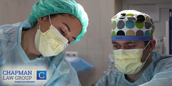 Doctors working on a patient and practicing good standard of care.