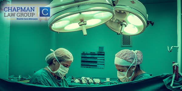 Doctors oporating on a patient.