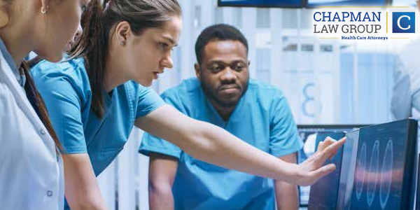 Medical Professionals Checking Records