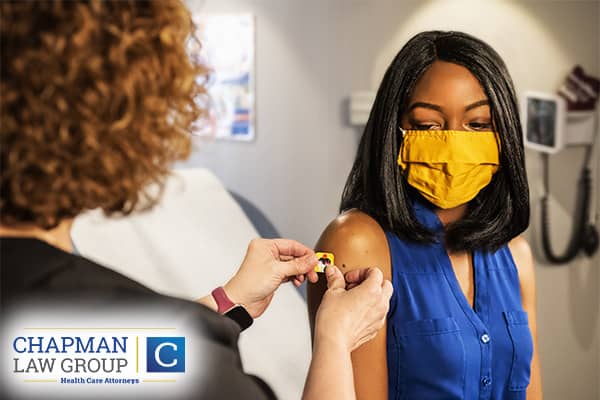 Doctor giving Covid-19 Vaccination