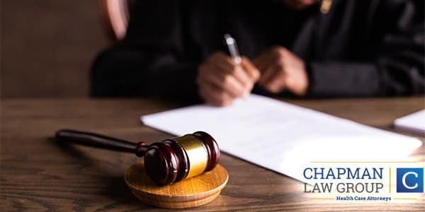 Judge approving a federal sentence reduction for a defendant because of amendment 821.